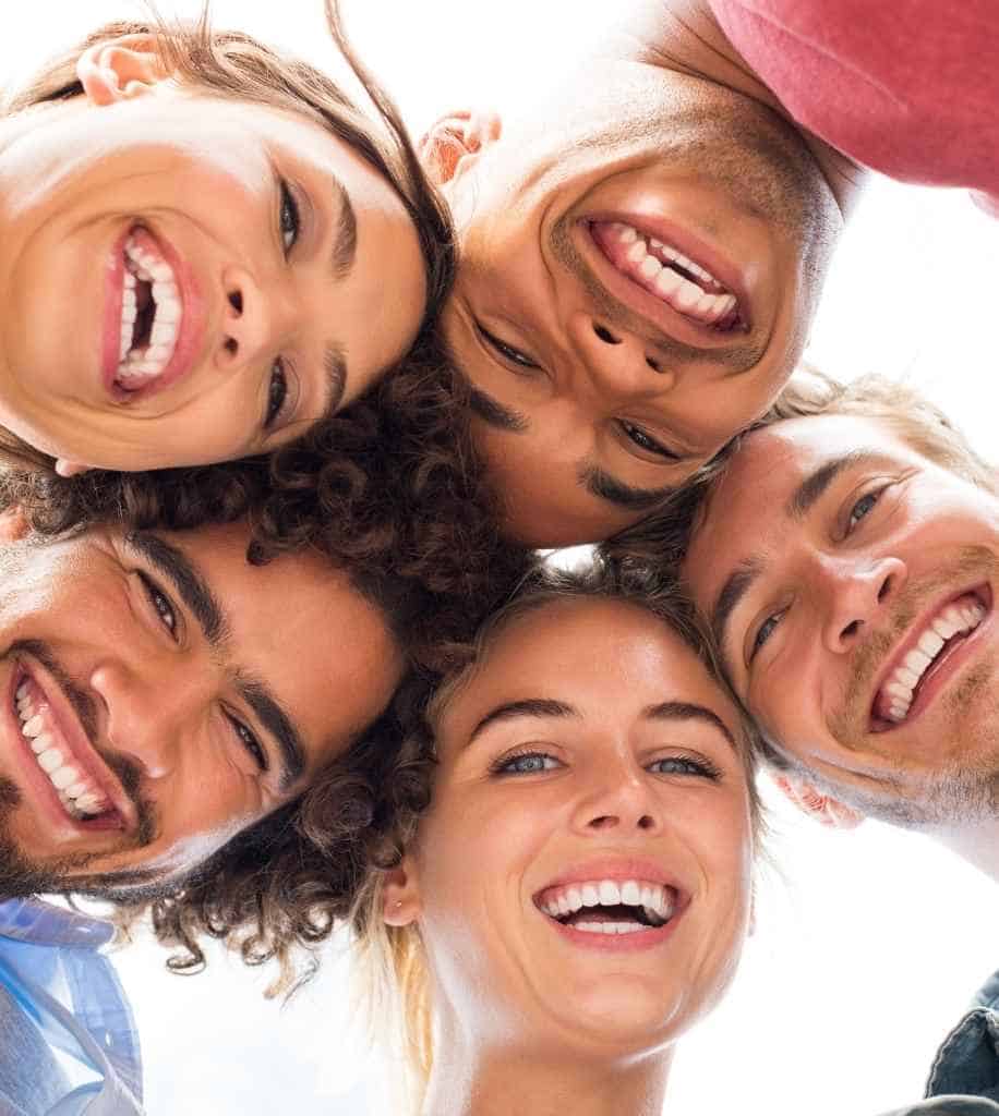 Smiling person showcasing white teeth after laser whitening treatment Maidstone